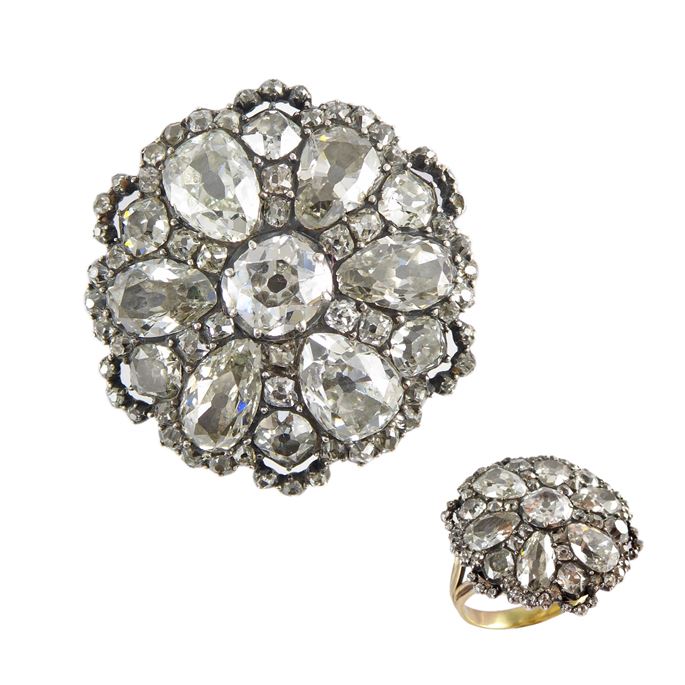 Late 18th century diamond flowerhead cluster ring c.1790, probably originally a button, the circular panel slightly domed and set with six pear cut diamond petals, | MasterArt